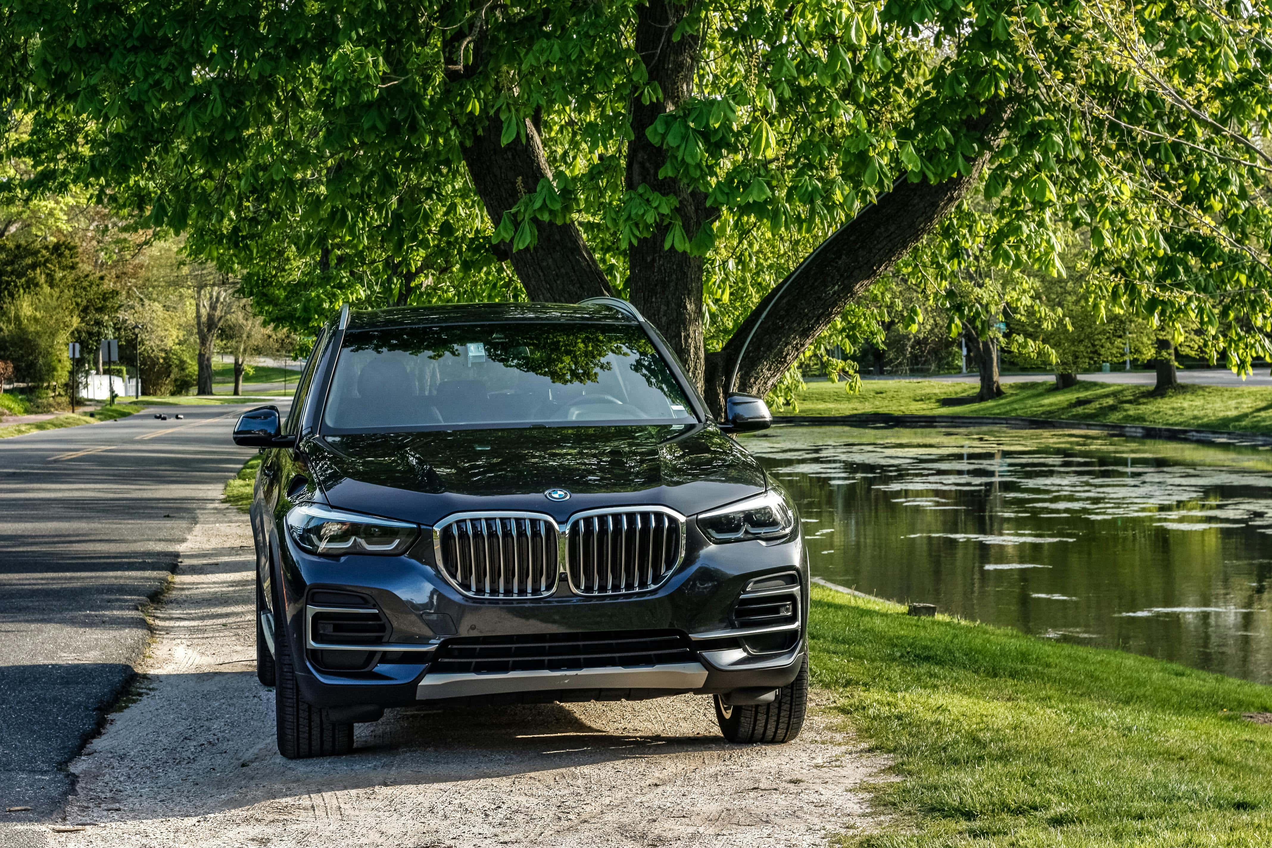 BMW X5 underbody after Boston winter – salt residue highlighting need for regular washes to prevent corrosion